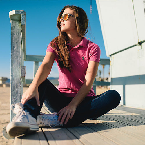 Woman wearing frosted greay red sunset