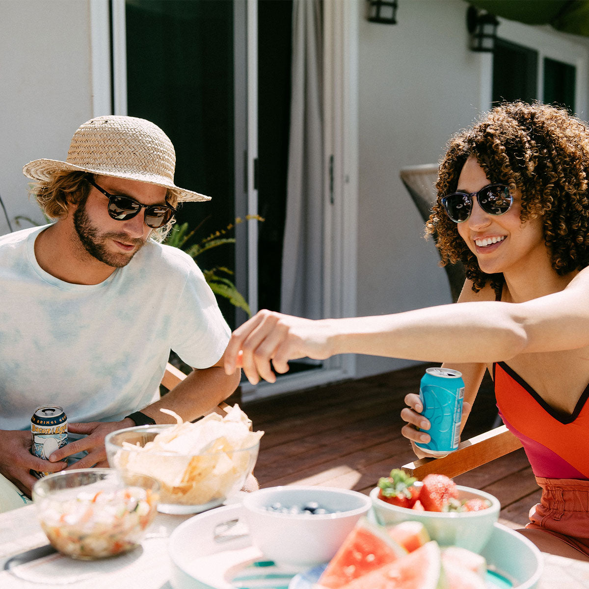 Male and female eating outside