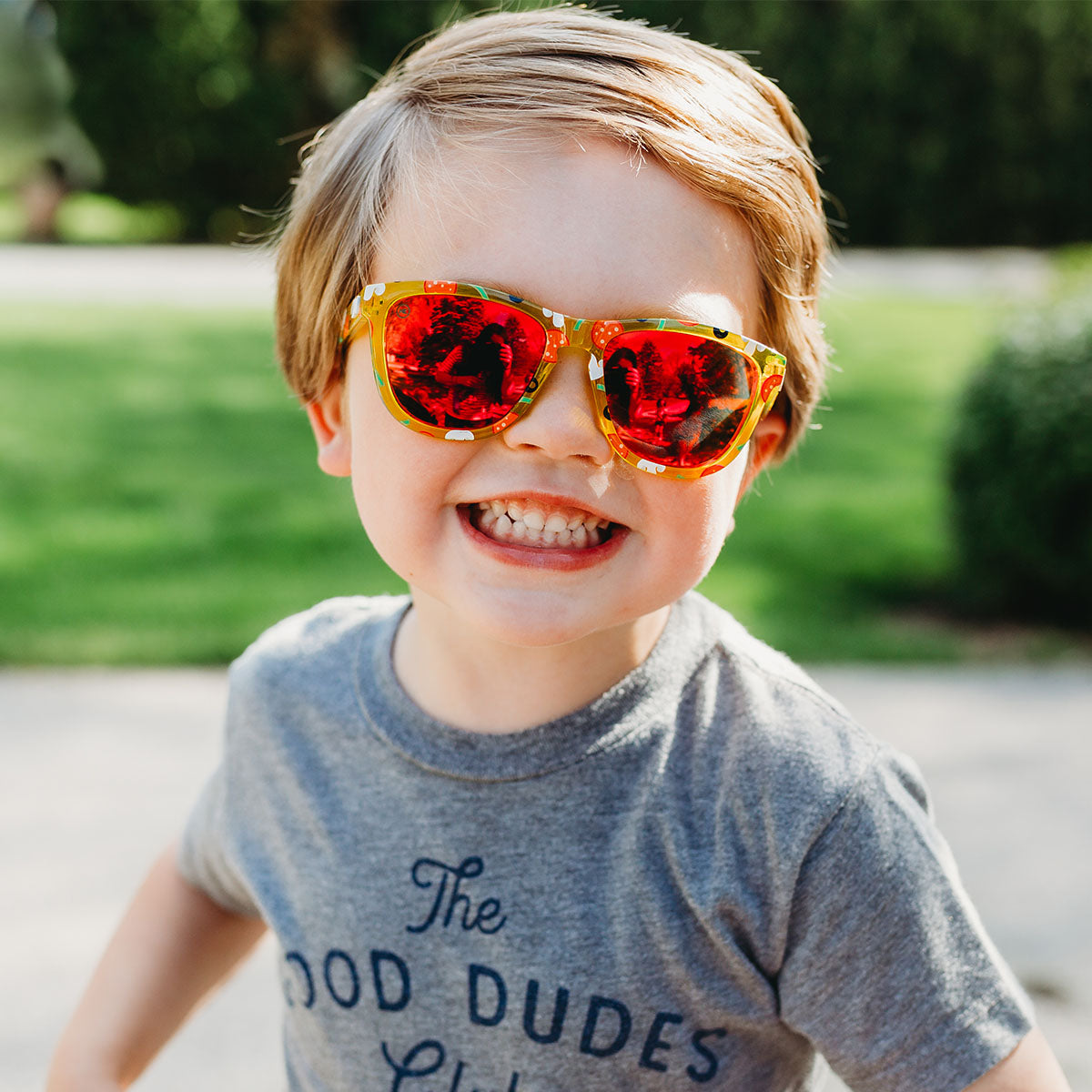 child in pizza themed sunglasses