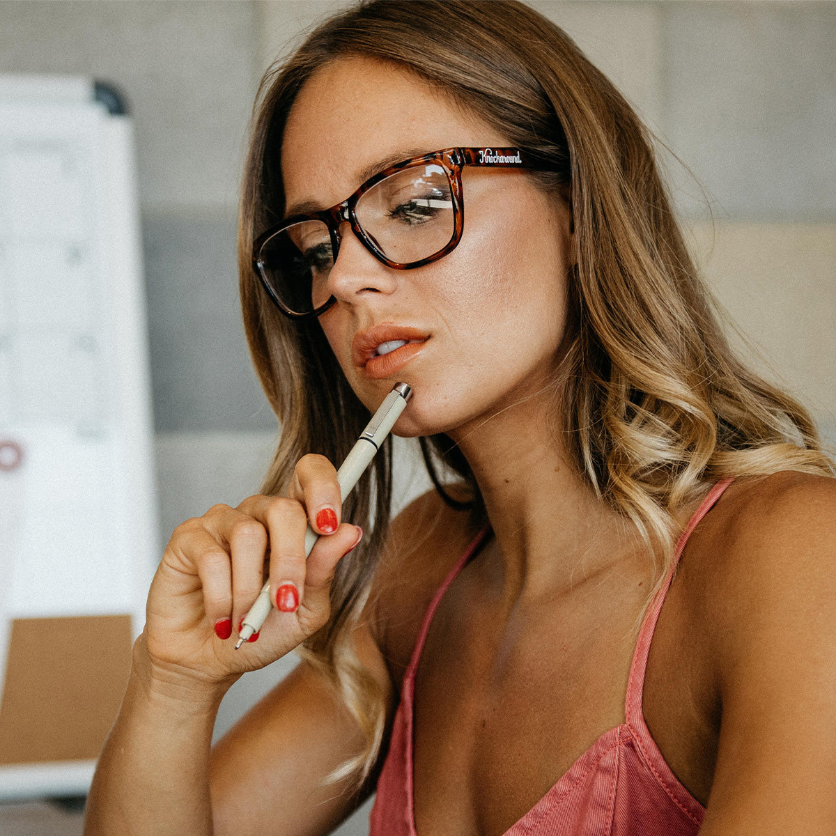 Woman wearing Knockaround Glossy Tortoise shell Fort Knocks Prescription Sunglasses