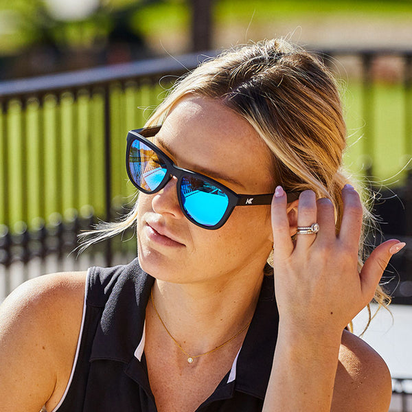 Woman wearing Knockaround Moonshot Premium Sport Sunglasses