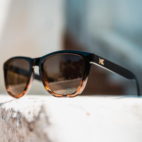Lifestyle Photo of Premiums Glossy Black and Tortoise Shell Fade / Amber Sunglasses