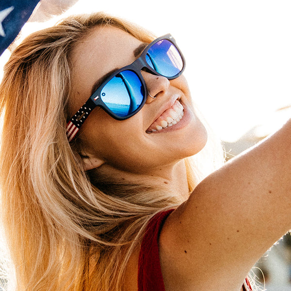 Woman wearing Knockaround Star Spangled Fort Knocks Sunglasses