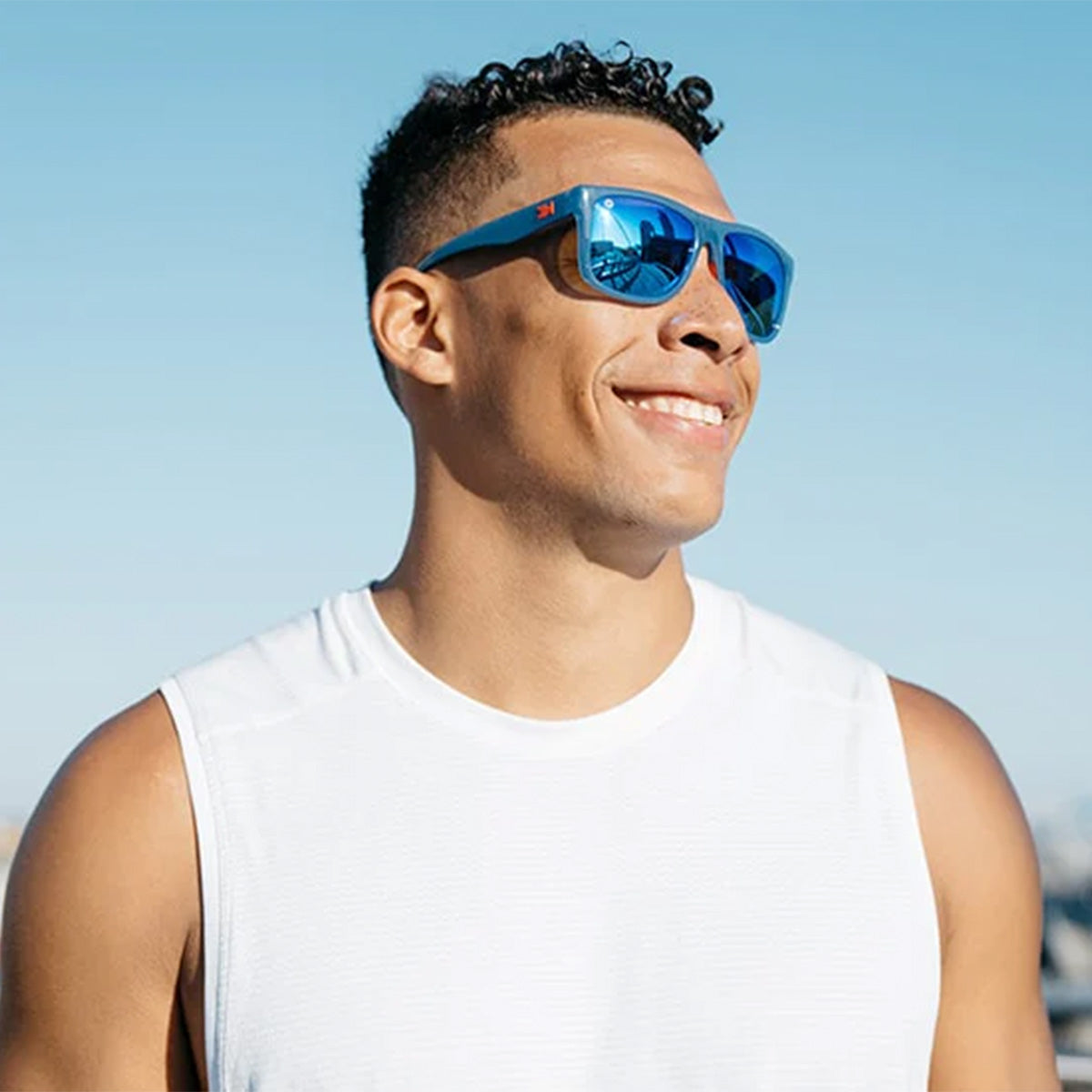 Man wearing Knockaround Victory Lap Torrey Pines Sports  Sunglasses