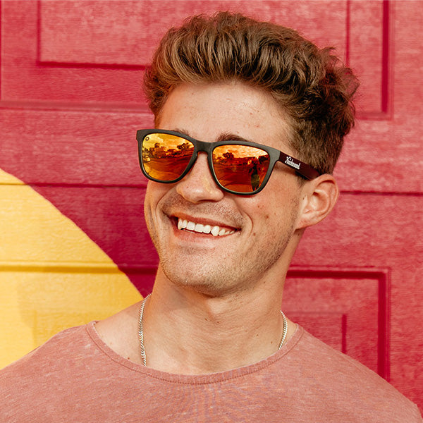 Man wearing Knockaround Black Sunset Classics Sunglasses