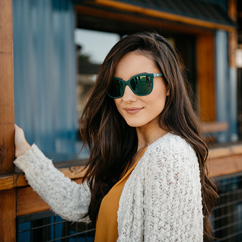 Woman wearing Knockaround Poison Ivy Deja Views Sunglasses