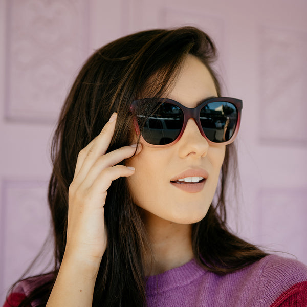 Woman wearing Knockaround Spanish Rose Deja Views Sunglasses
