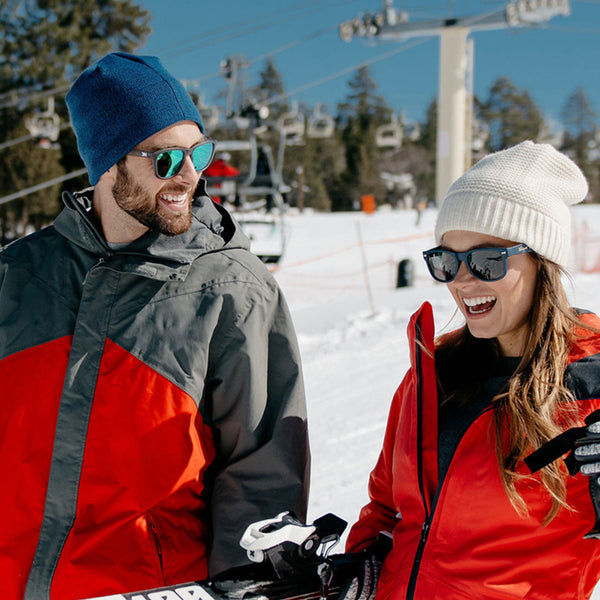 Couple wearing Knockaround Sunglasses