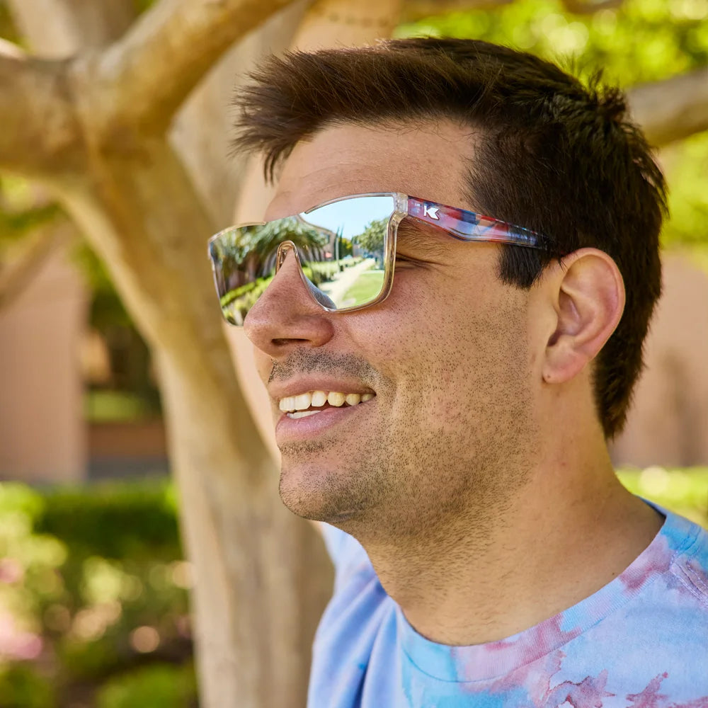 Man wearing Live Free or Tie-Dye Afters Sunglasses