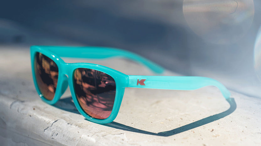 Lifestyle photo of Aquamarine / Fuchsia Premiums Sport Sunglasses