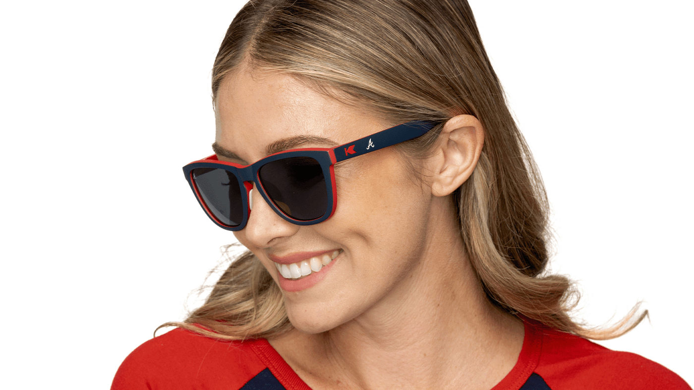 Woman wearing MLB Atlanta Braves Sunglasses