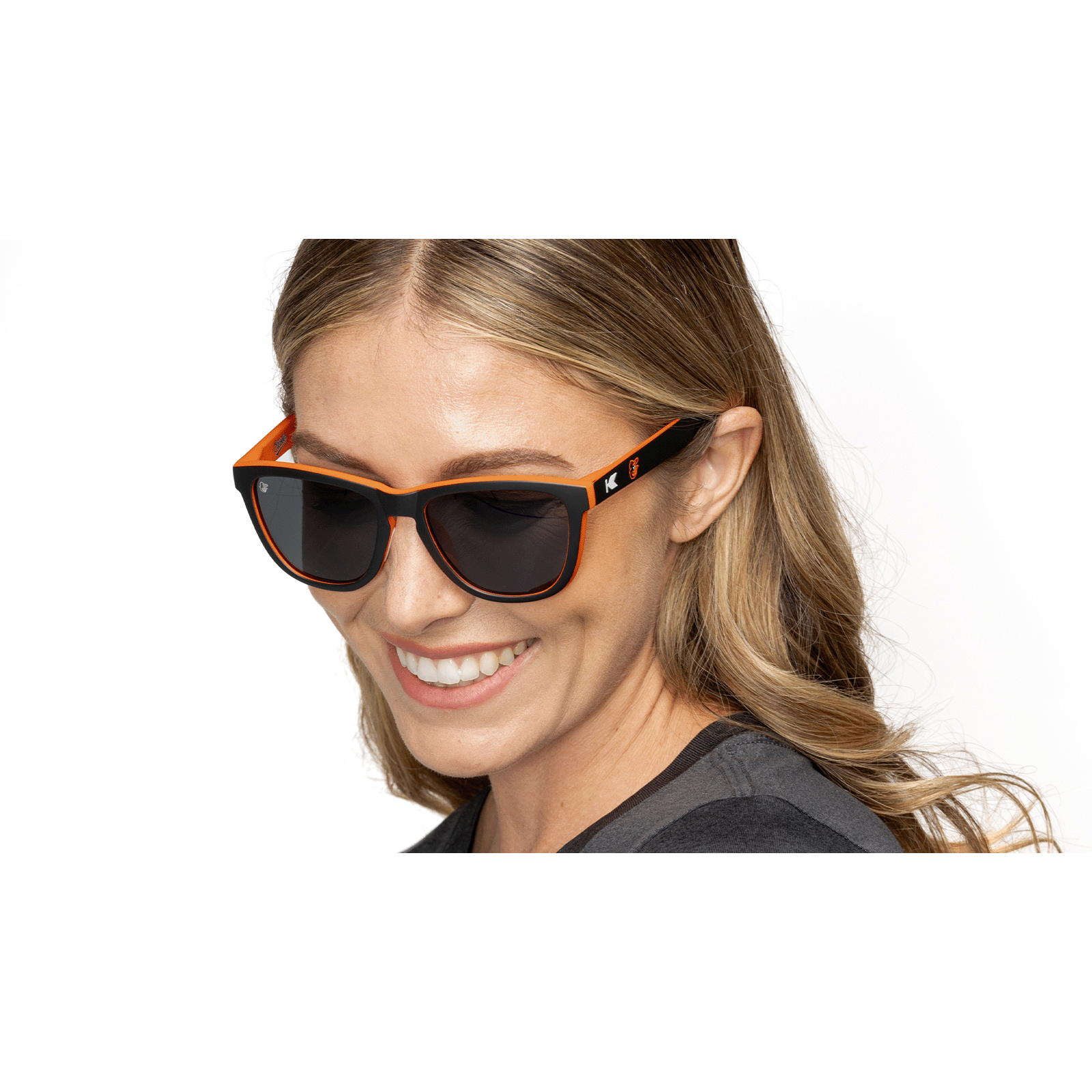 Woman wearing MLB Baltimore Orioles Sunglasses