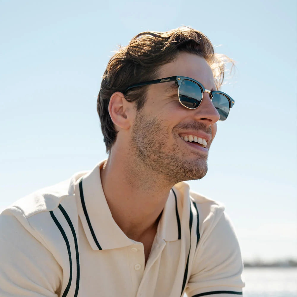 Man wearing Glossy Black & Gold Brooklines sunglasses