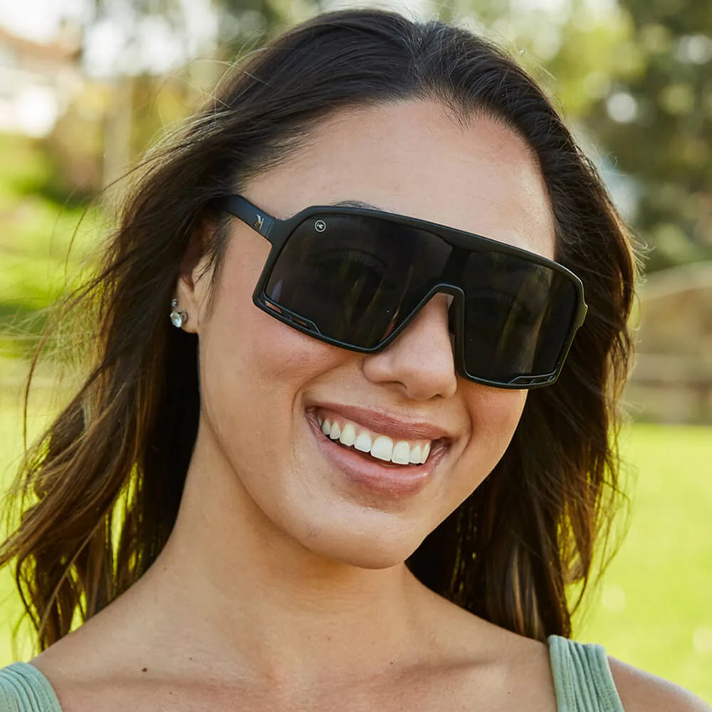 Women wearing Black on Black Campeones Sunglasses