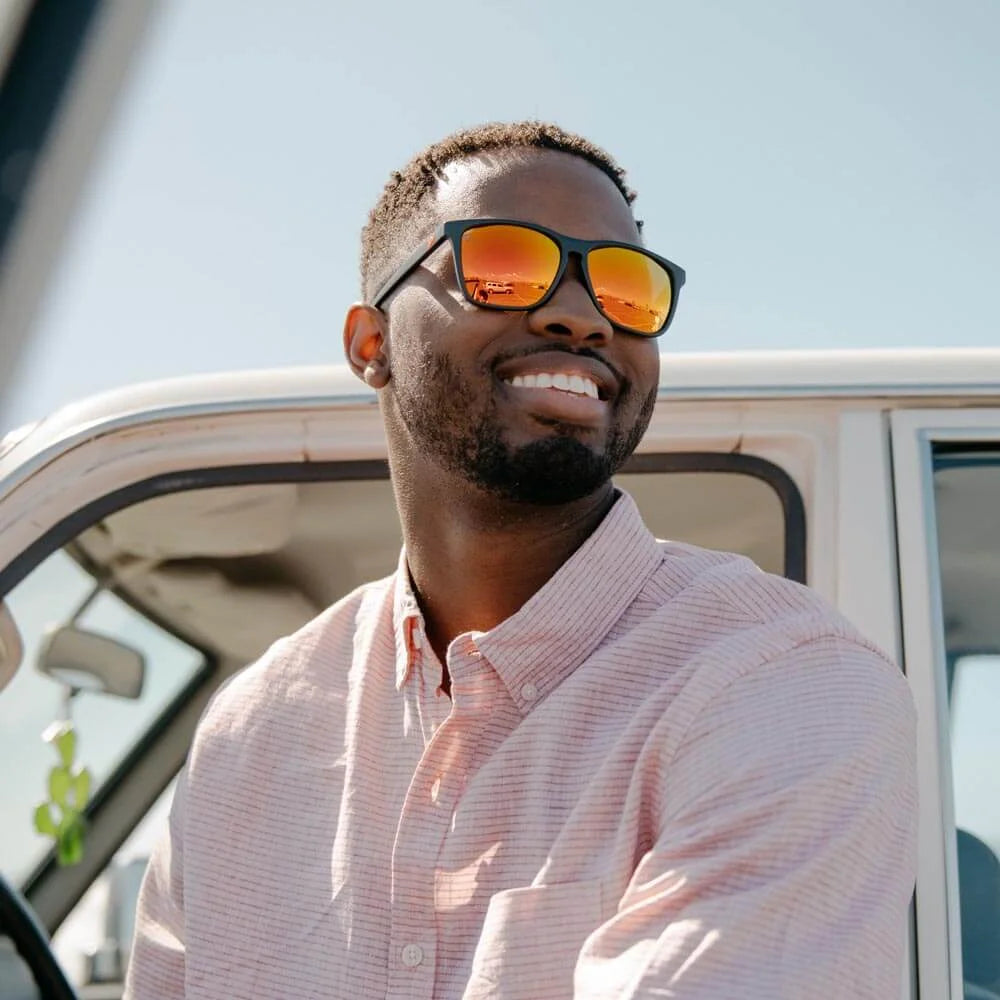 Men wearing Matte Black / Red Sunset Fast Lanes Sunglasses