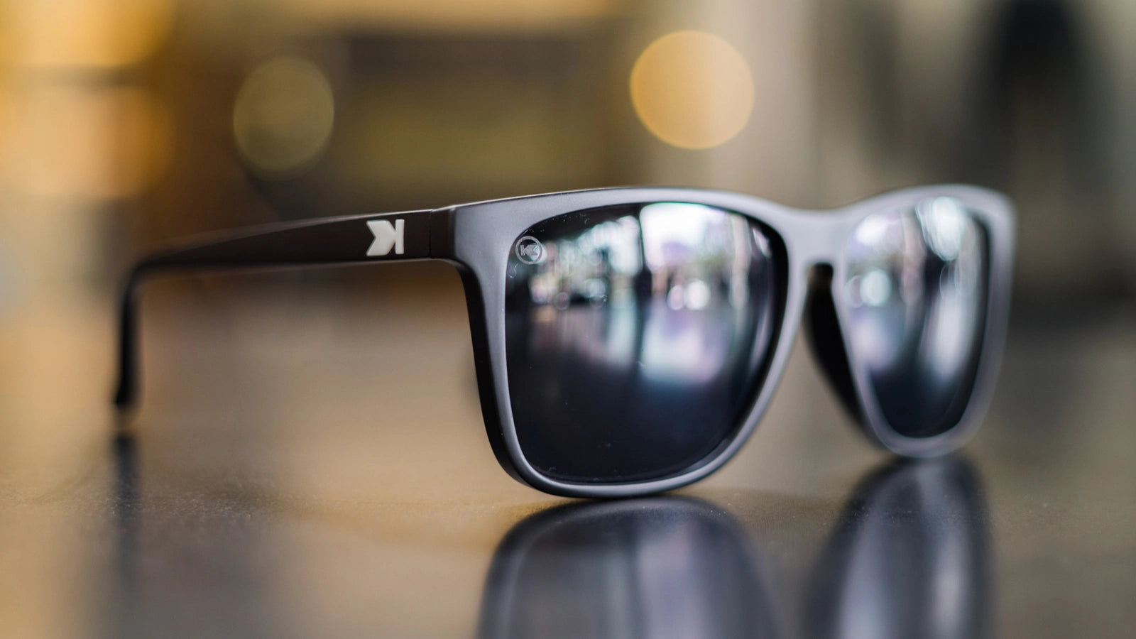 Lifestyle photo of Matte Black / Smoke Fast Lanes Sunglasses