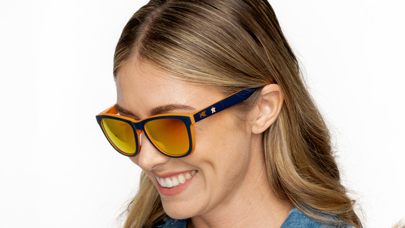 Woman wearing MLB Houston Astros Sunglasses
