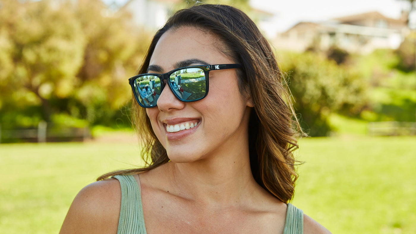 Sport Sunglasses with Jelly Black Frame and Polarized Sky Blue Lenses Female Shot