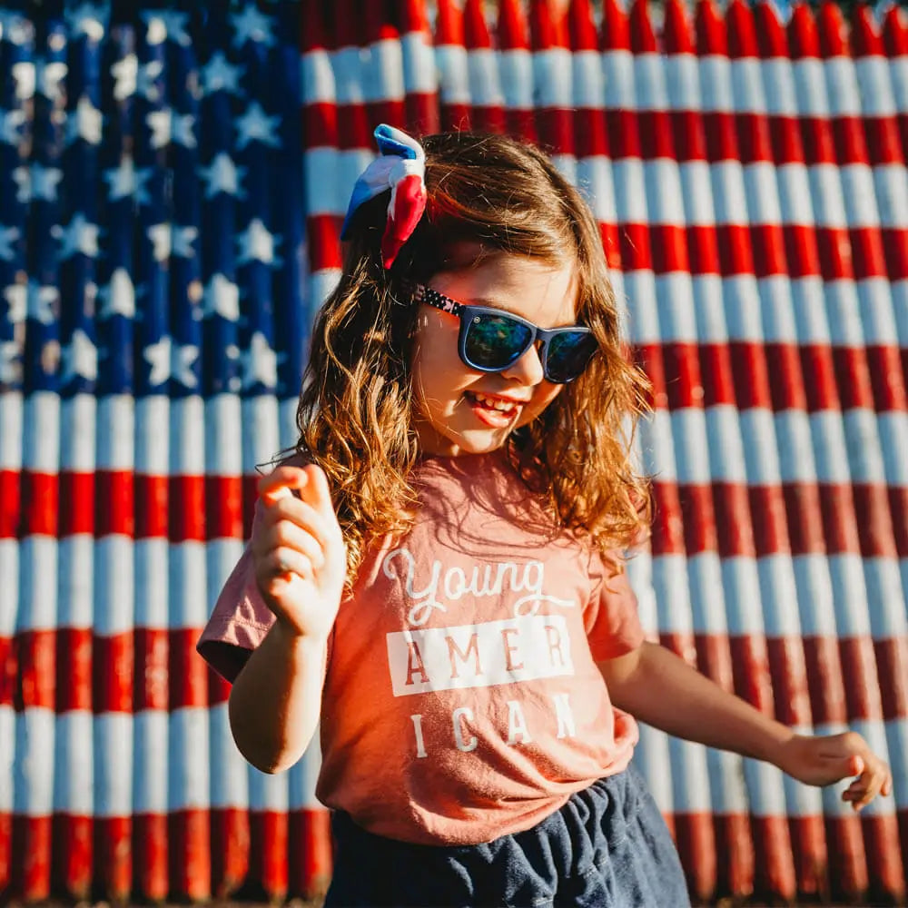 Girl wearing Star Spangled Kids Premiums Sunglasses