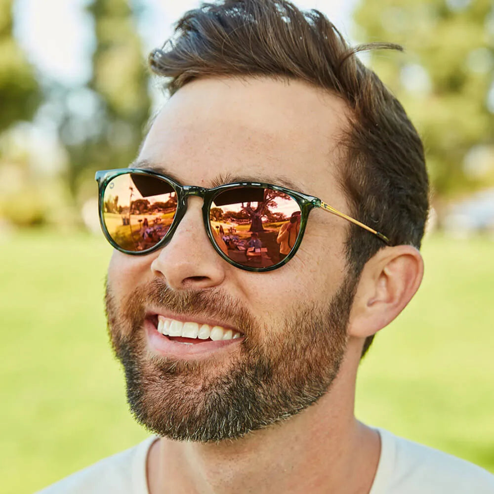 Man wearing Slate Tortoise Shell Rose Gold Mary Janes sunglasses