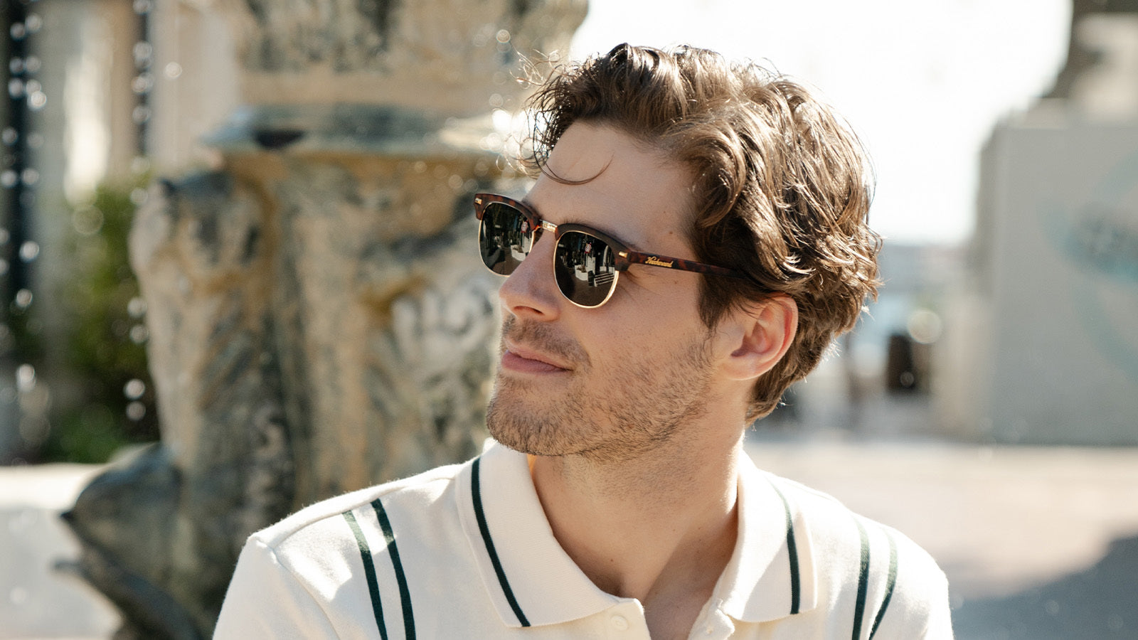 Man wearing Matte Tortoise Shell & Gold Brooklines Prescription Glasses