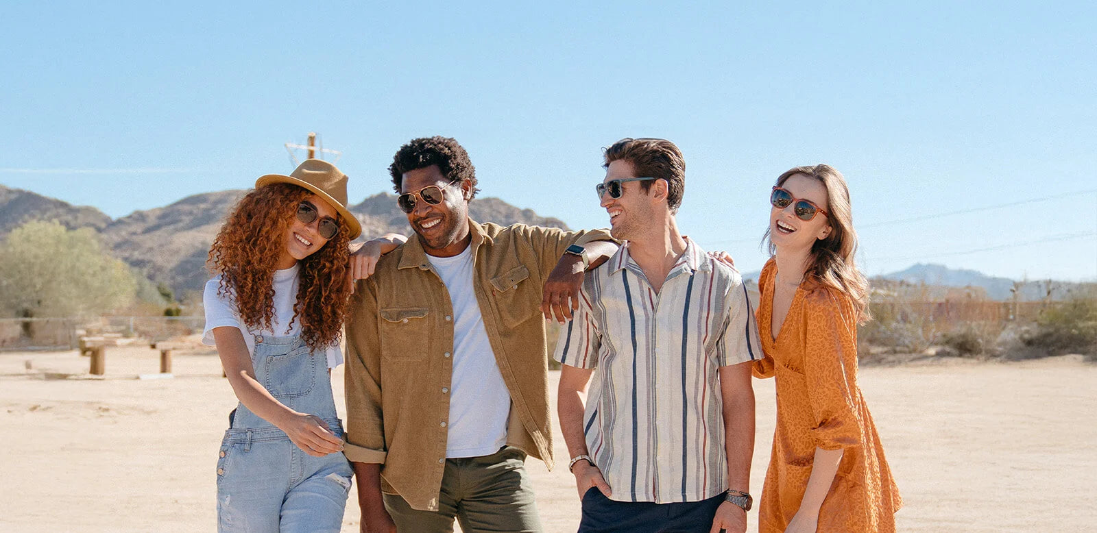 People wearing Knockaround sunglasses smiling