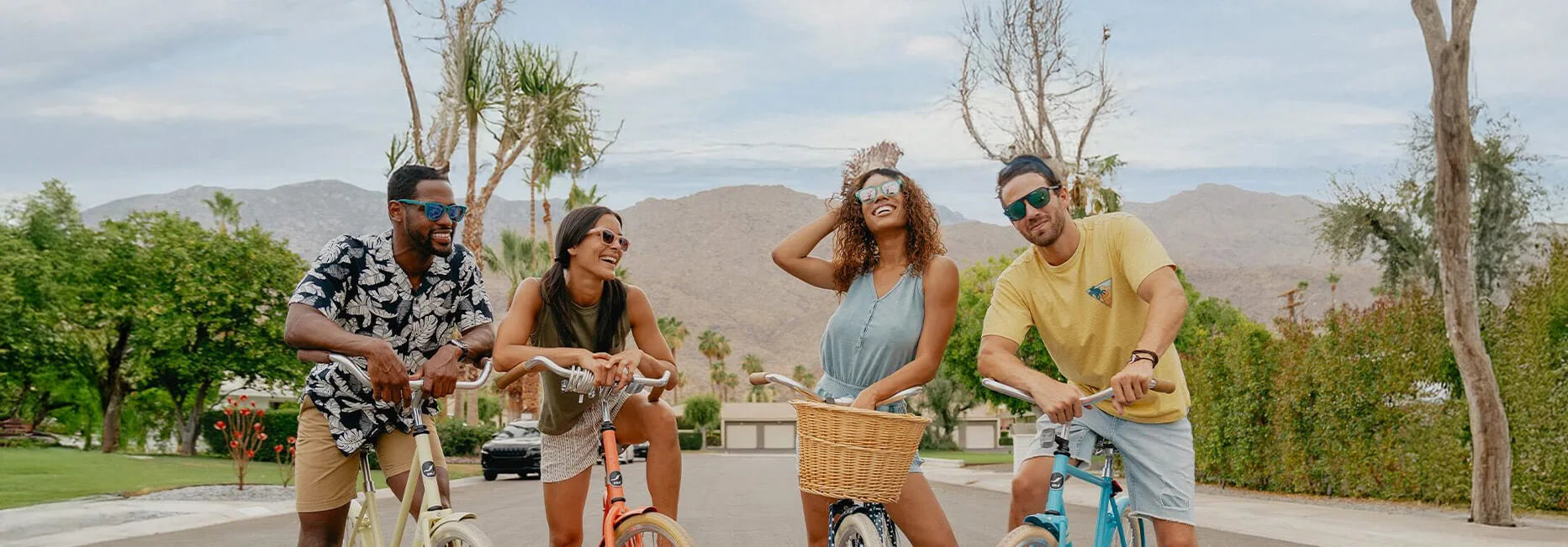 People wearing Knockaround sunglasses riding bikes