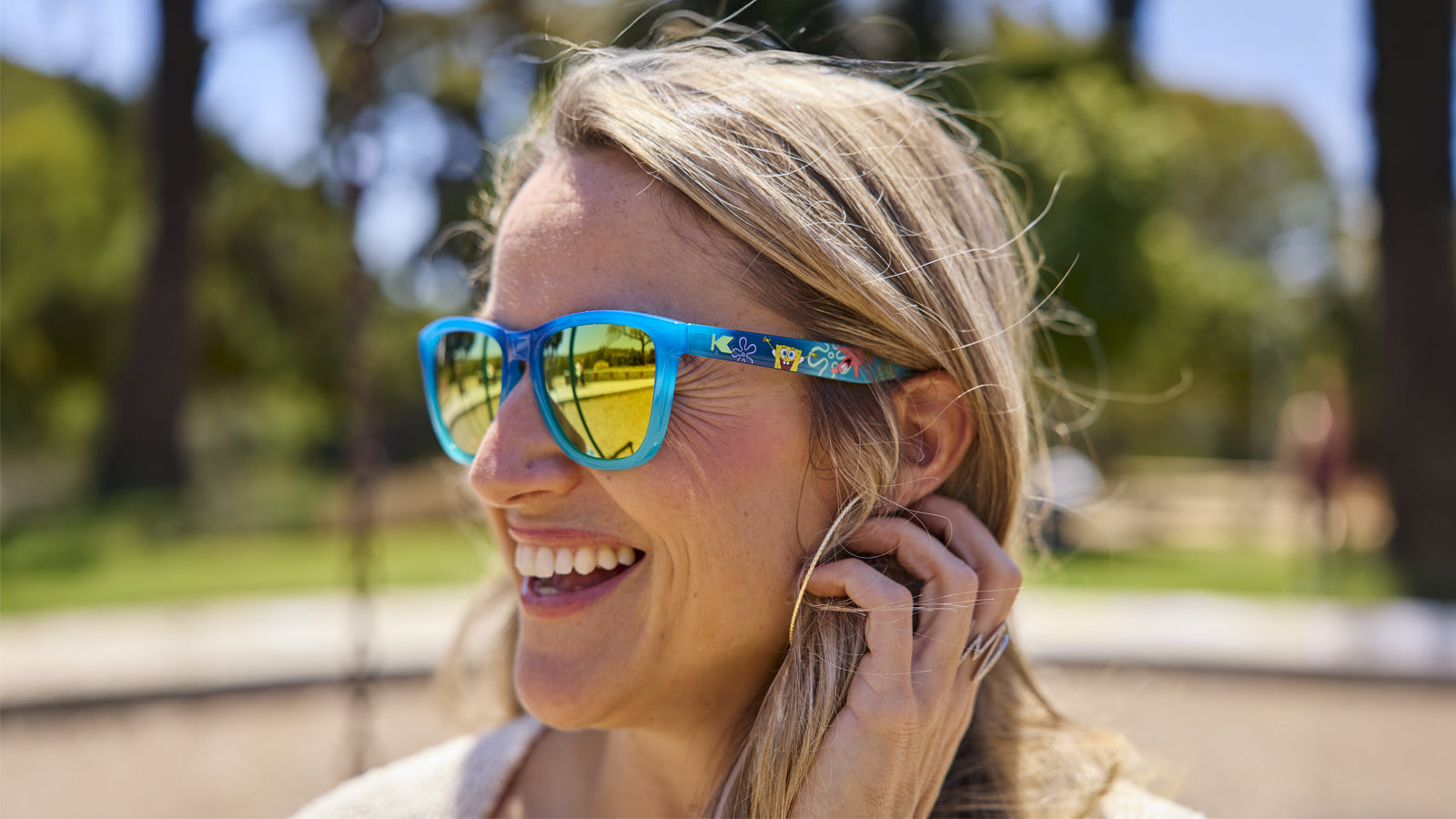 Woman wearing SpongeBob SquarePants Premiums Sunglasses