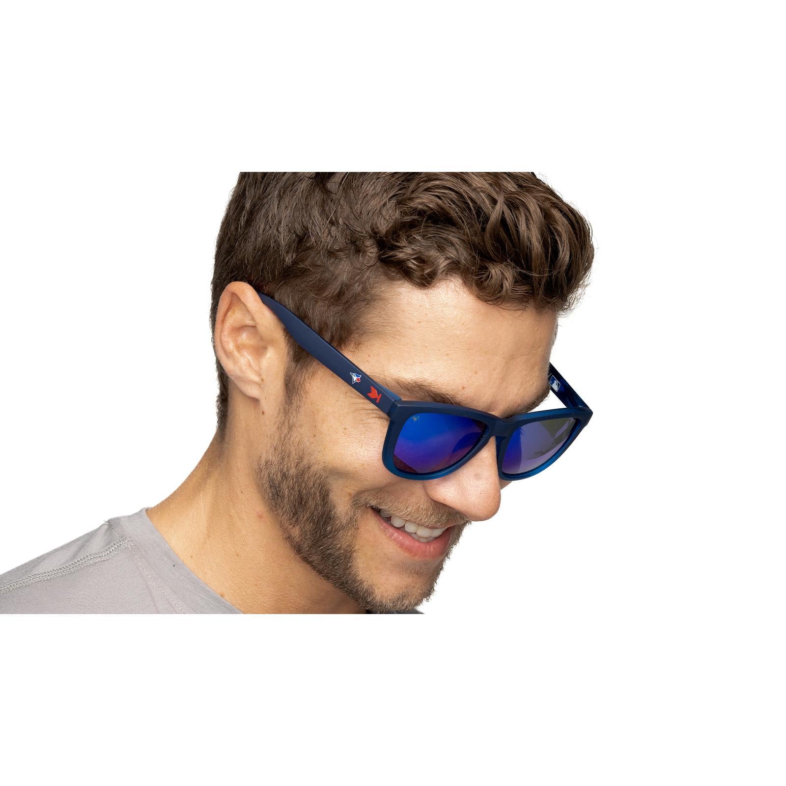 Man wearing MLB Toronto Blue Jays Sunglasses