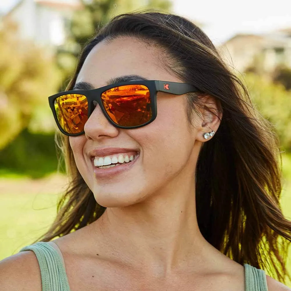 Women wearing Matte Black / Red Sunset Torrey Pines Sunglasses