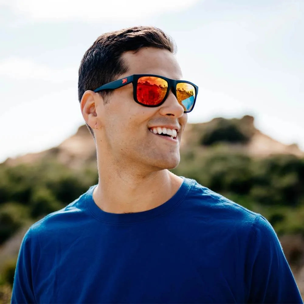 Men wearing Matte Black / Red Sunset Torrey Pines Sunglasses