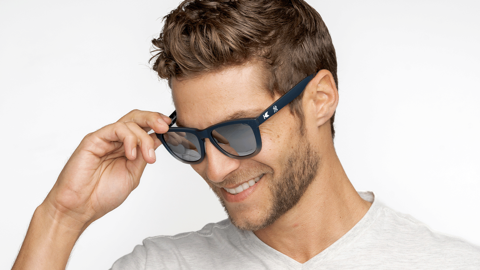 Man wearing MLB New York Yankees Sunglasses