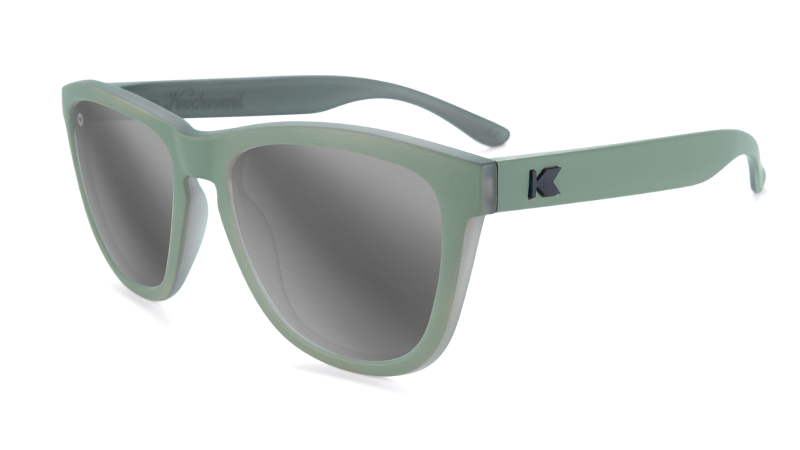 Green sunglasses with silver smoke mirrored lenses