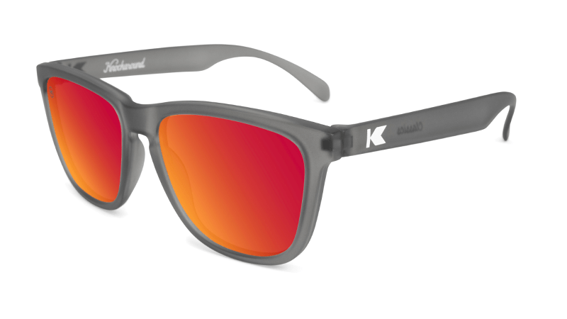 Frosted grey translucent sunglasses with red square lenses