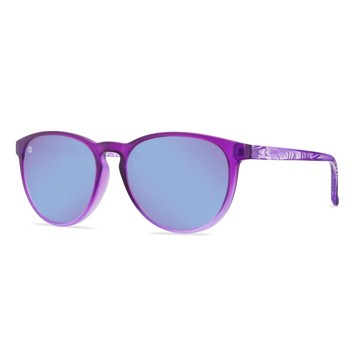 Sunglasses with purple front and palm tree arms, threequarter