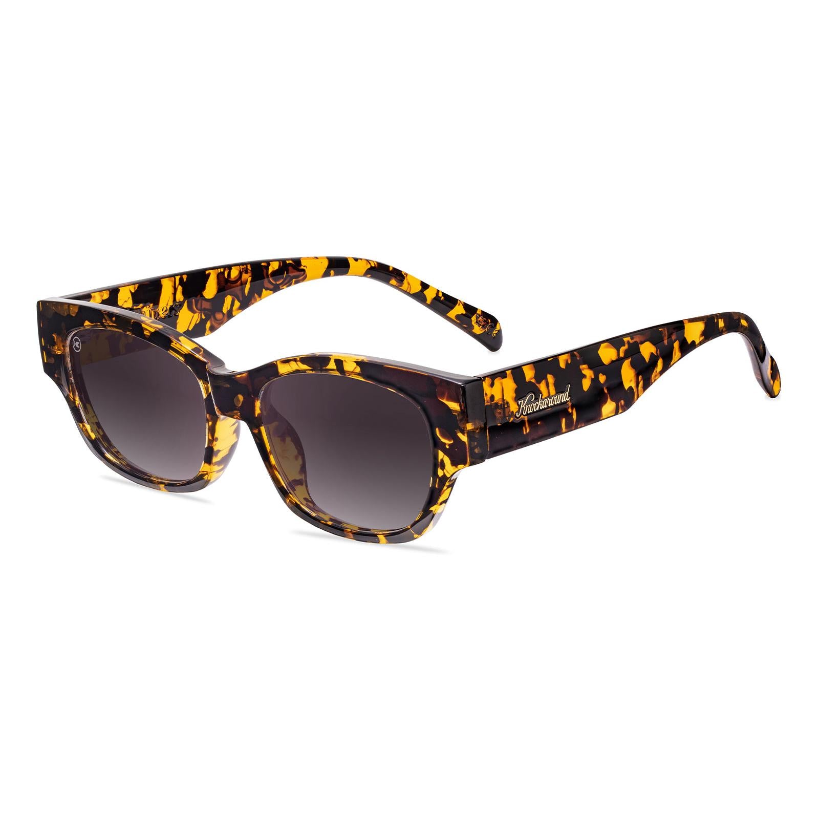 Sunglasses with an inky amber tortoise frame and polarized smoke gradient lenses, Flyover