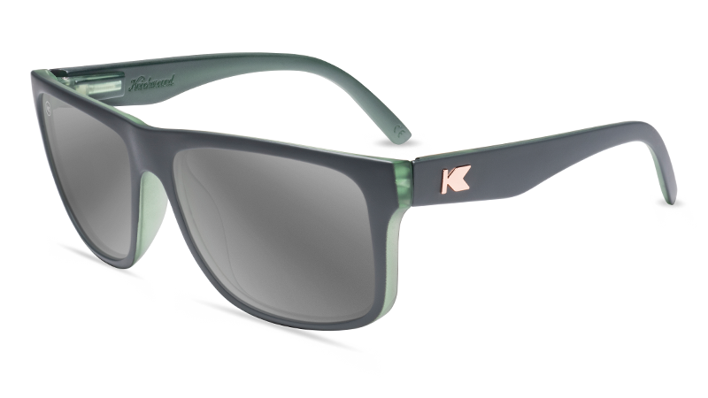 Grey and green sunglasses with silver smoke mirrored lenses