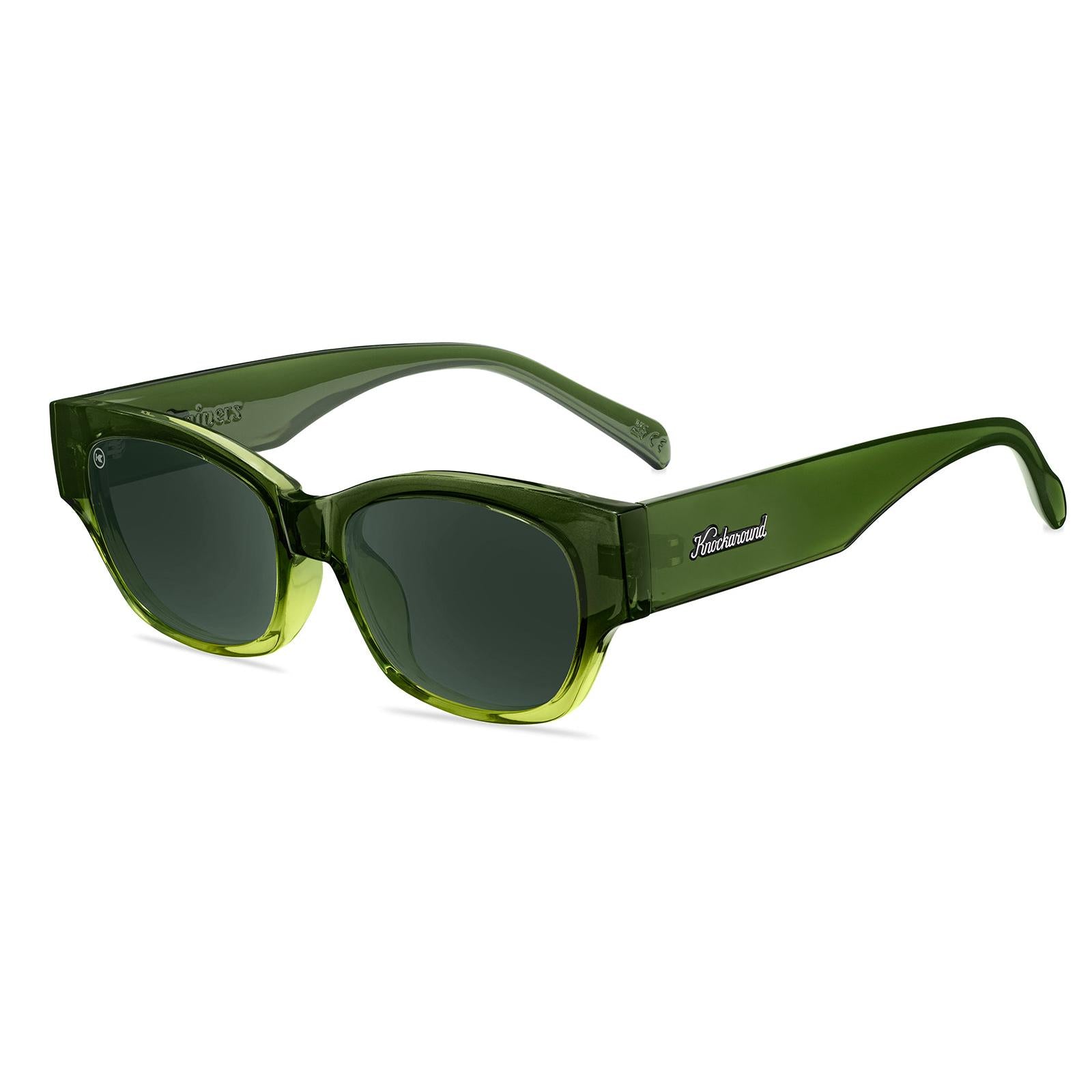 Sunglasses with a glossy seaweed green fade frame and polarized aviator green lenses, Flyover