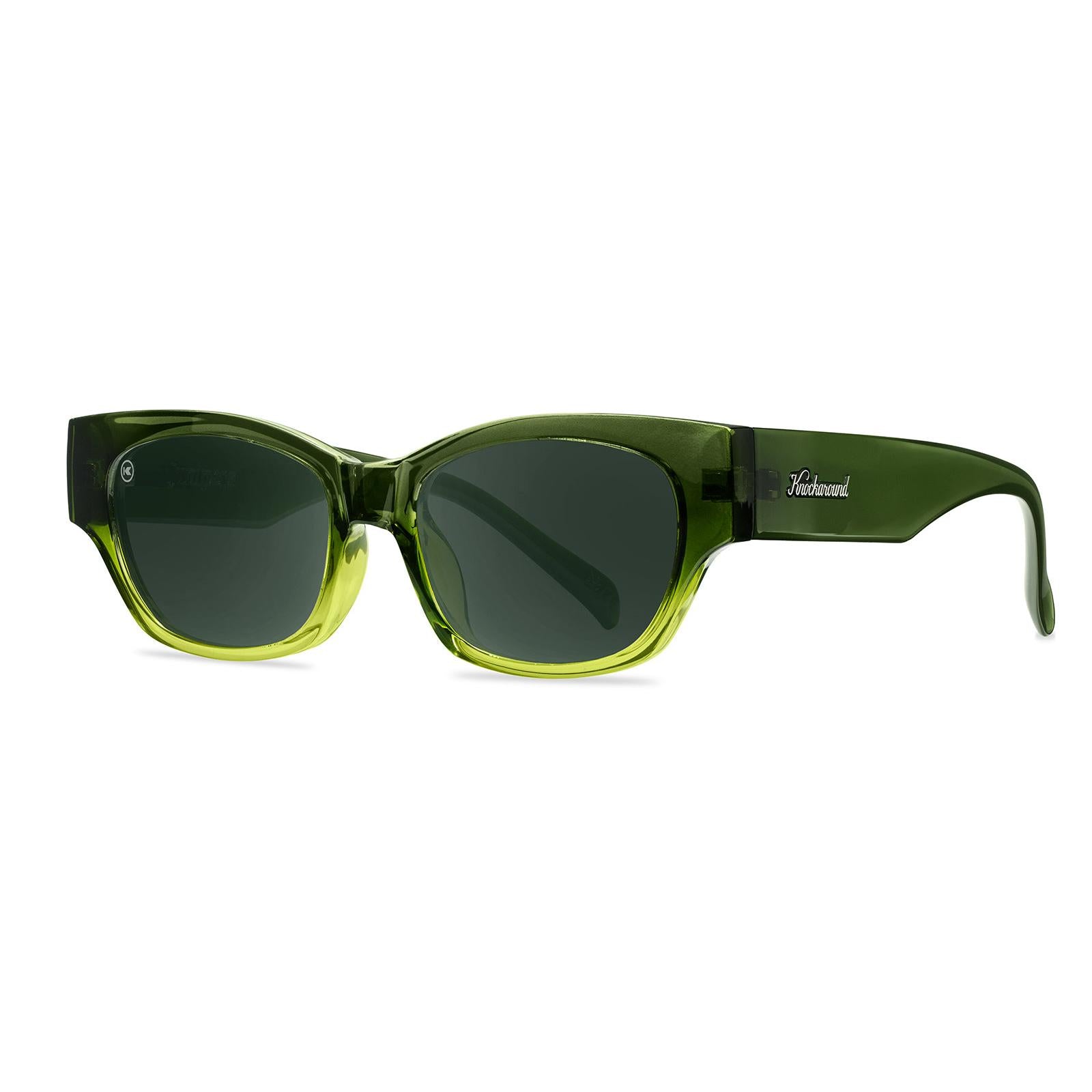 Sunglasses with a glossy seaweed green fade frame and polarized aviator green lenses, Threequarter