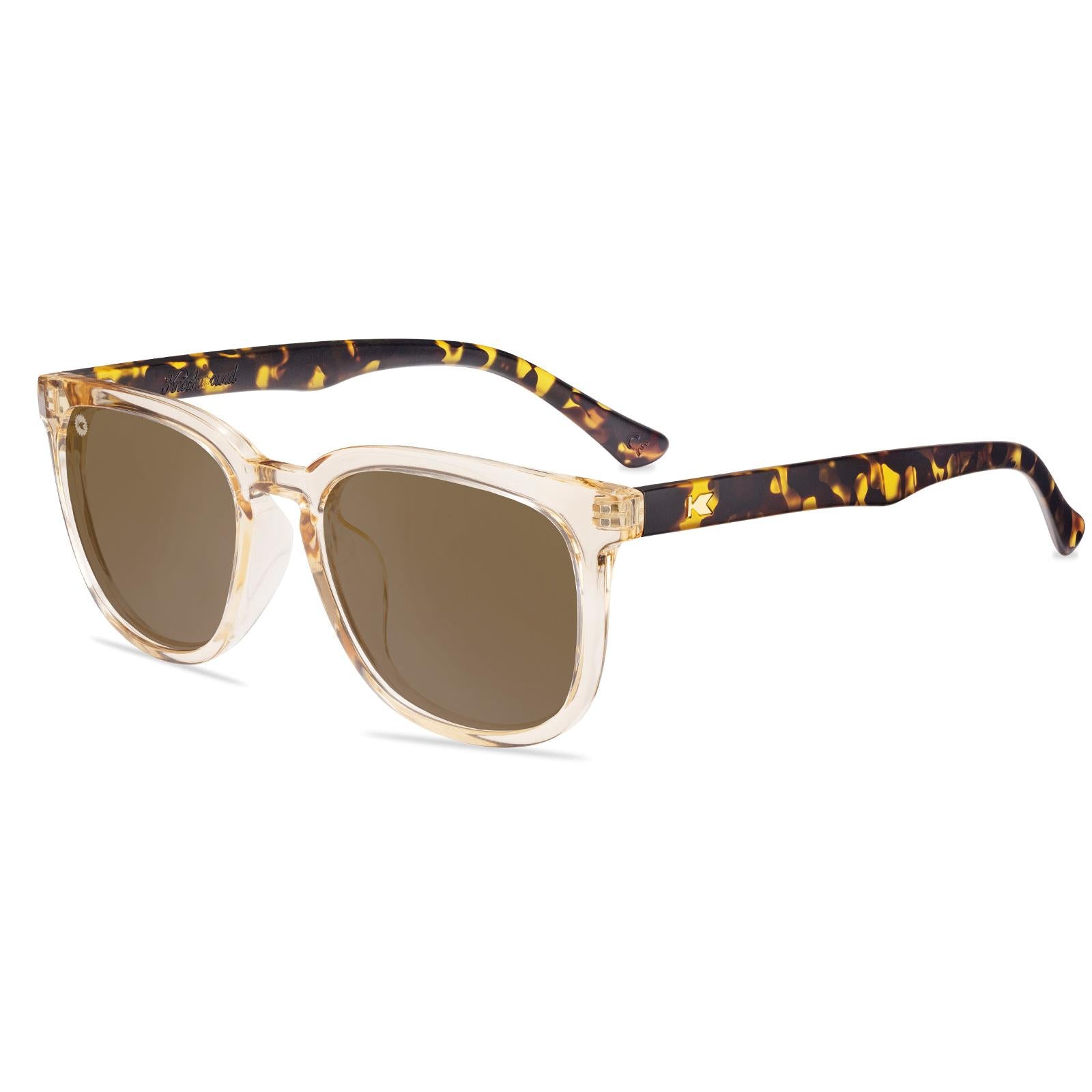 Sunglasses with Glossy translucent amber fronts Matte tortoise shell arms Polarized amber lenses
