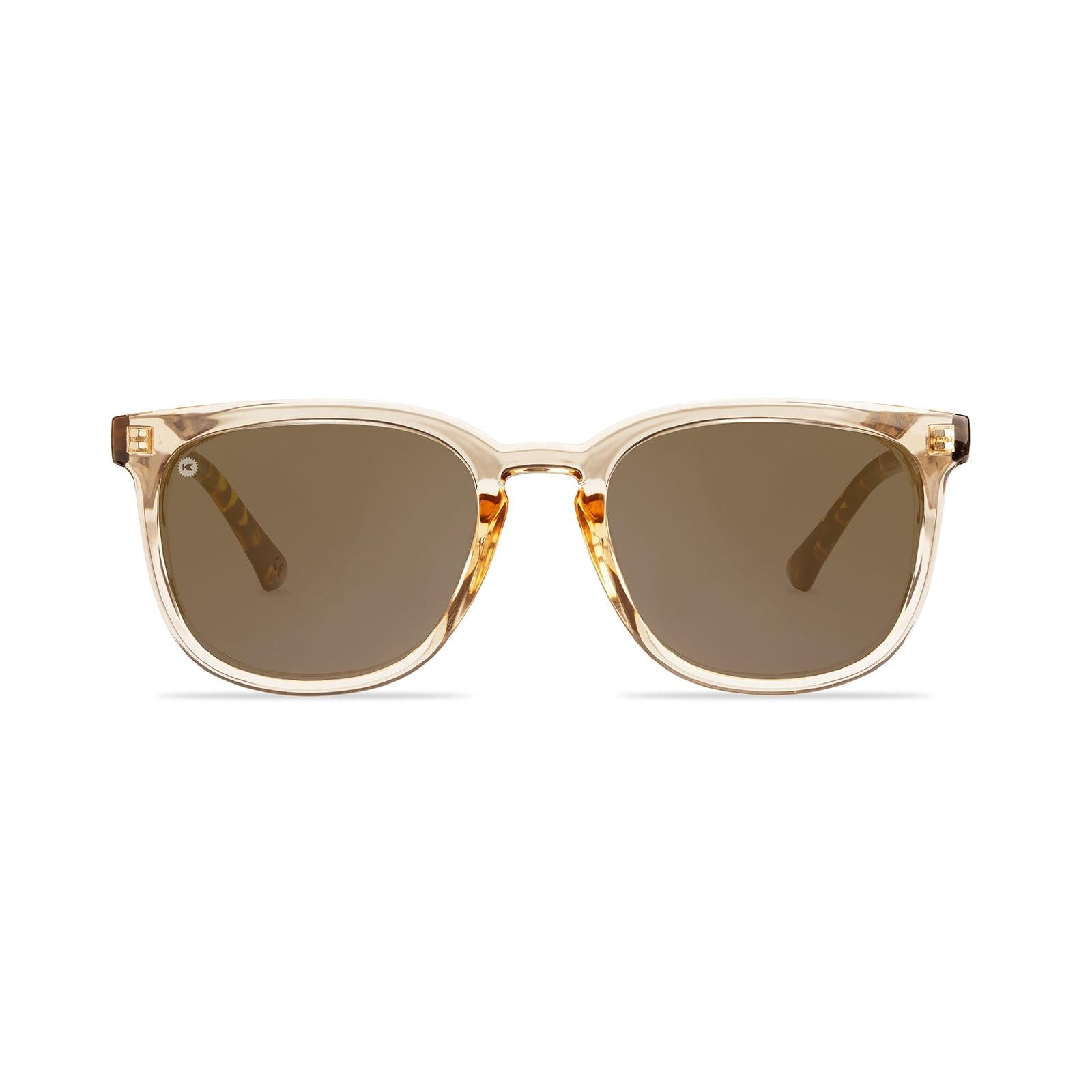 Sunglasses with Glossy translucent amber fronts Matte tortoise shell arms Polarized amber lenses