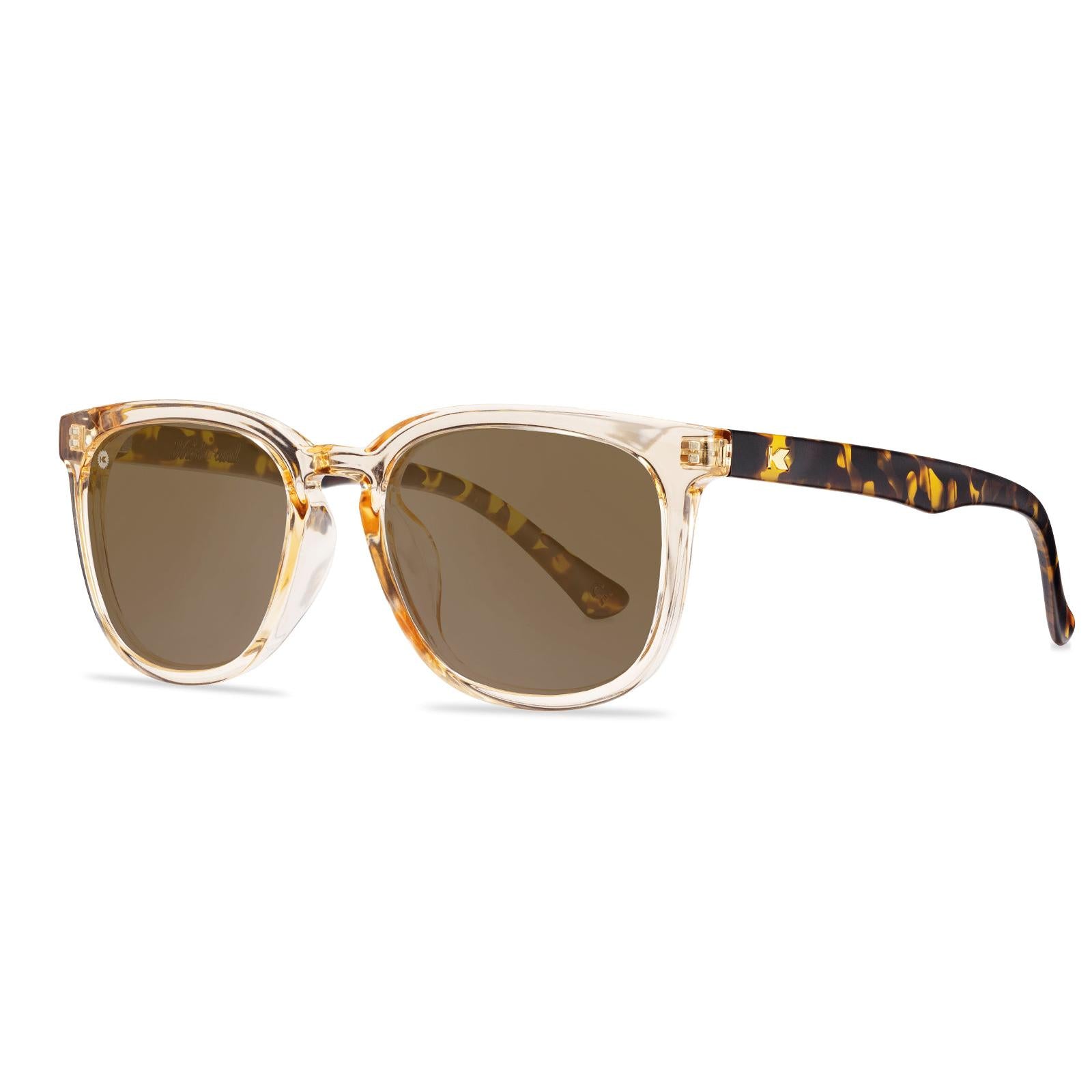 Sunglasses with Glossy translucent amber fronts Matte tortoise shell arms Polarized amber lenses
