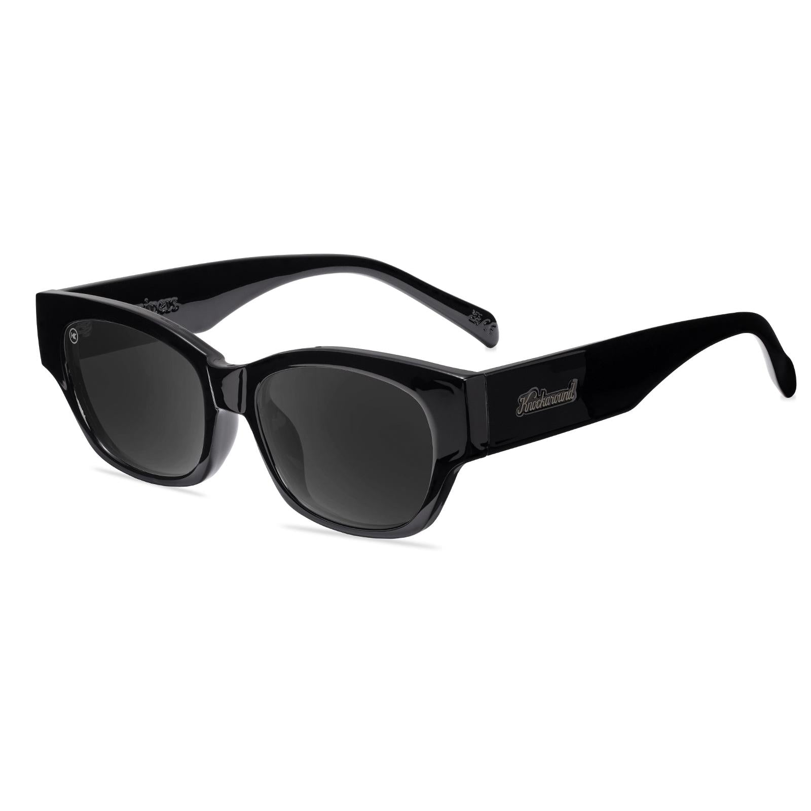 Sunglasses with a glossy black frame and polarized smoke lenses, Flyover