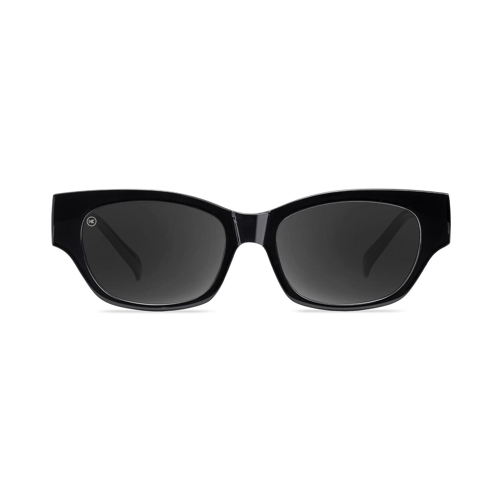 Sunglasses with a glossy black frame and polarized smoke lenses, Front