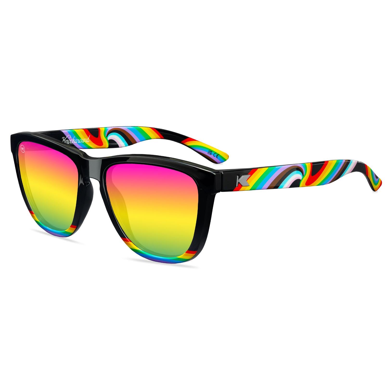 Sunglasses with Glossy black fronts with rainbow accent at bottom, Progress Pride color swirl across arms Silver K-logos Polarized rainbow lenses