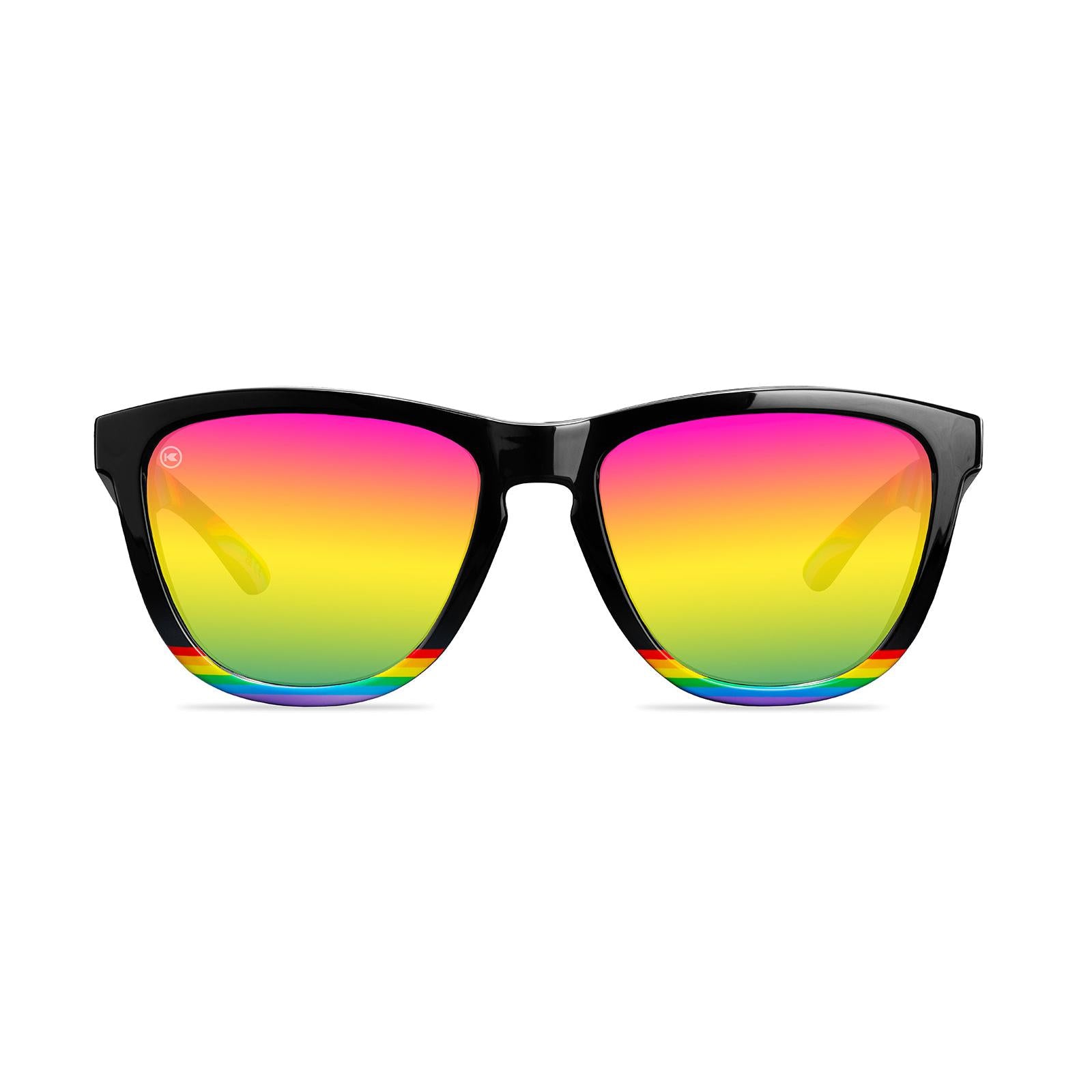 Sunglasses with Glossy black fronts with rainbow accent at bottom, Progress Pride color swirl across arms Silver K-logos Polarized rainbow lenses