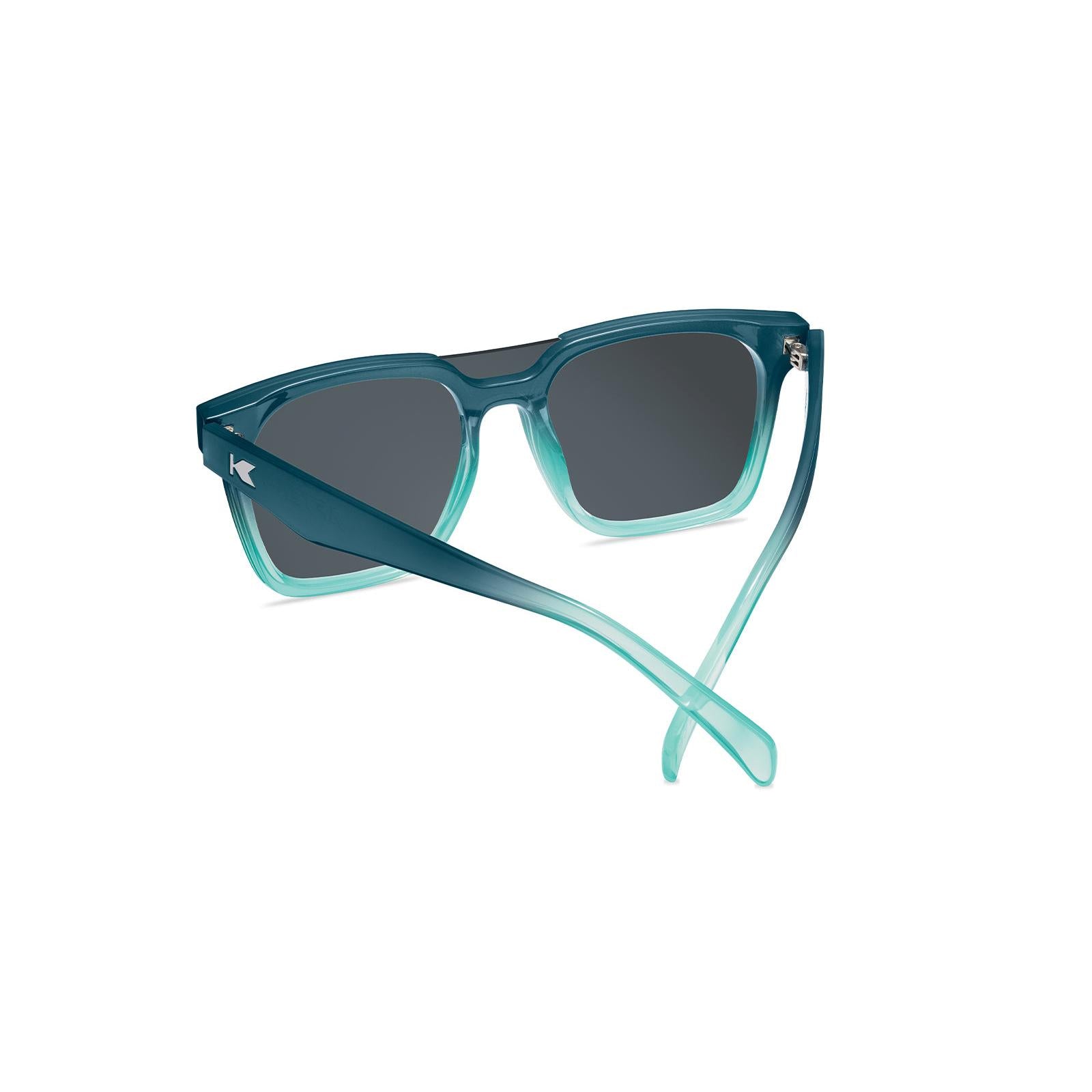 Sunglasses with a blue frame with polarized blue lenses, back