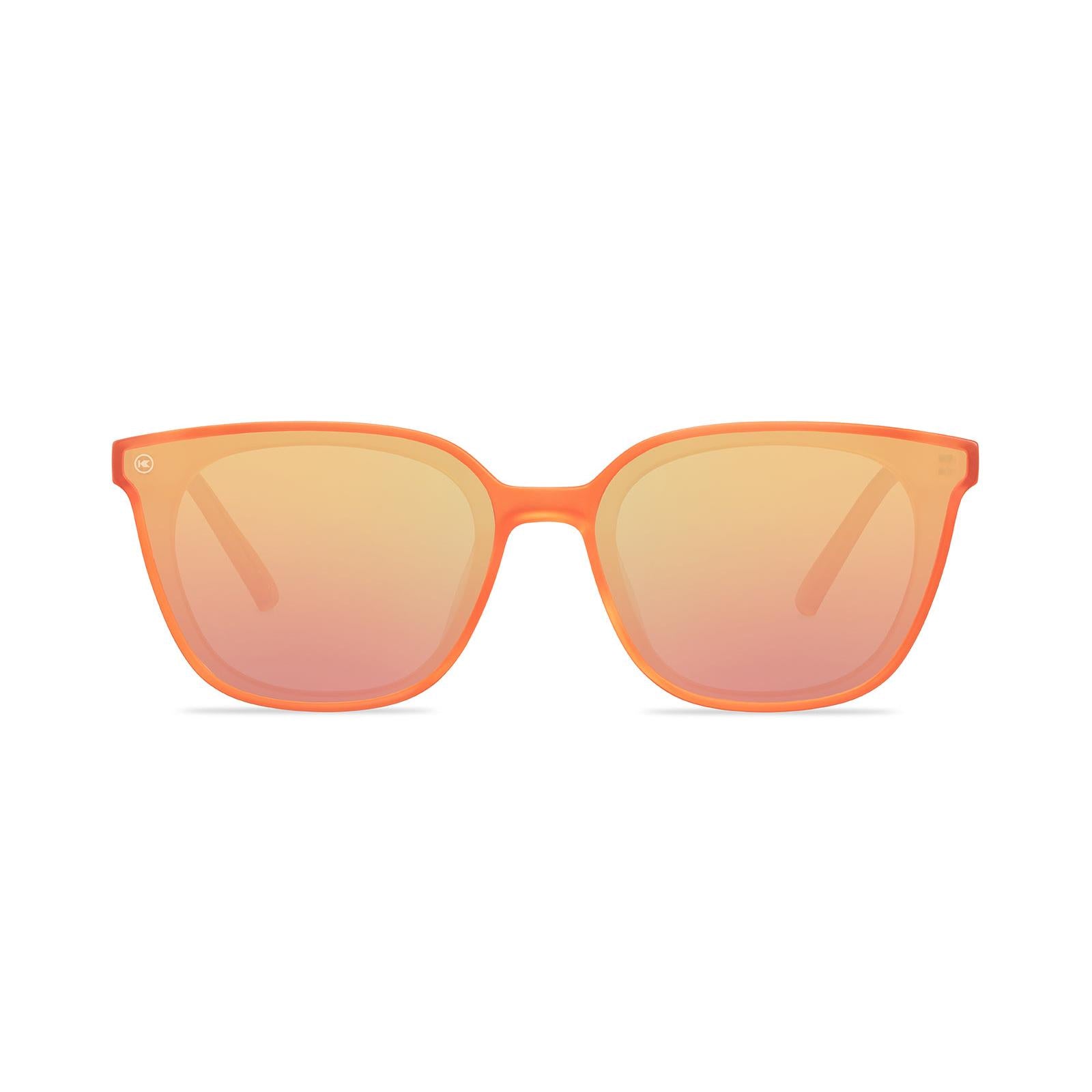 Sunglasses with an orange frame with polarized orange lenses, front