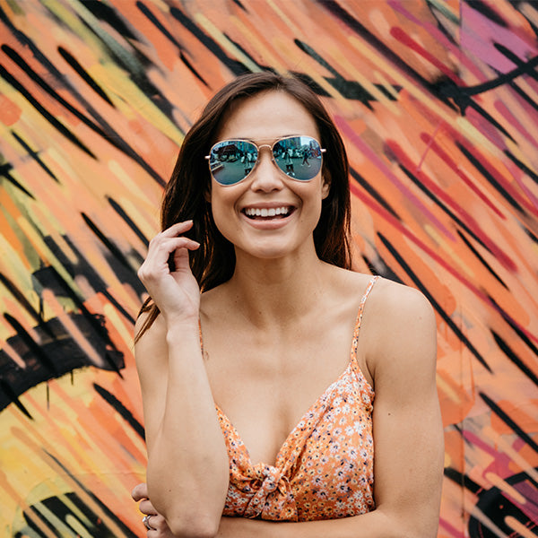 Women wearing Mile Highs Sunglassses