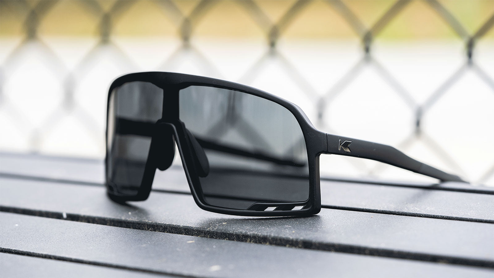 Lifestyle photo of Black on Black Campeones Sunglasses